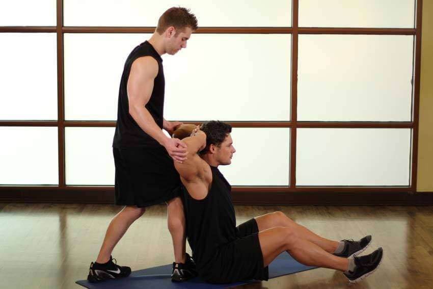 Behind Head Chest Stretch — end position
