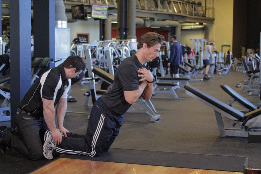 Floor Glute-Ham Raise — end position