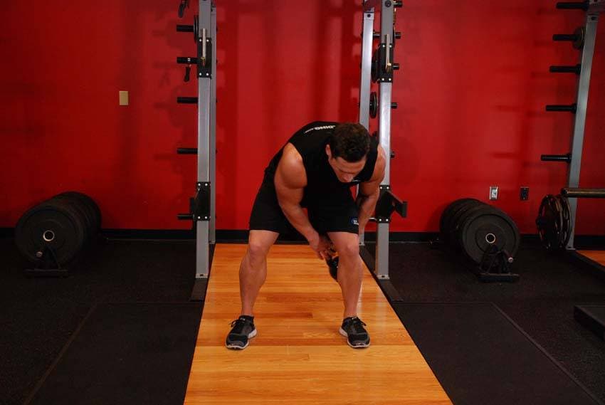 Kettlebell Figure 8 — starting position