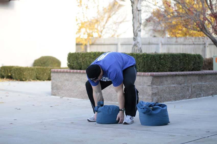 Sandbag Load — starting position
