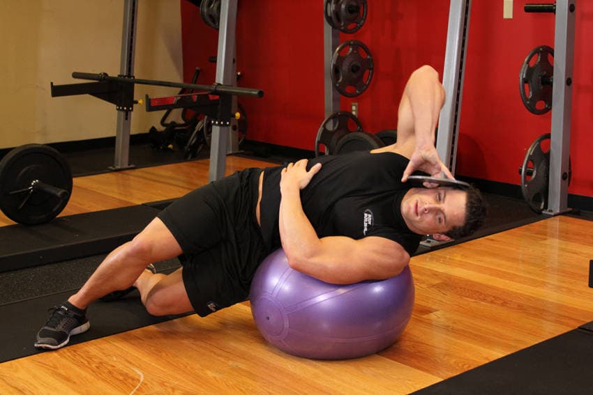 Weighted Ball Side Bend — starting position