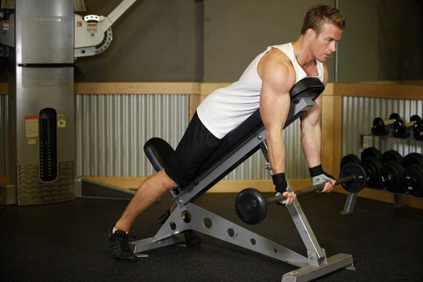 Barbell Curls Lying Against An Incline — starting position