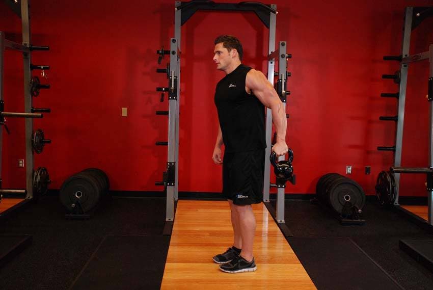 Bottoms-Up Clean From The Hang Position — end position
