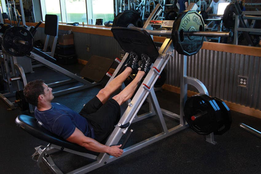 Calf Press On The Leg Press Machine — end position