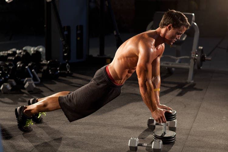Close-Grip Push-Up off of a Dumbbell — starting position