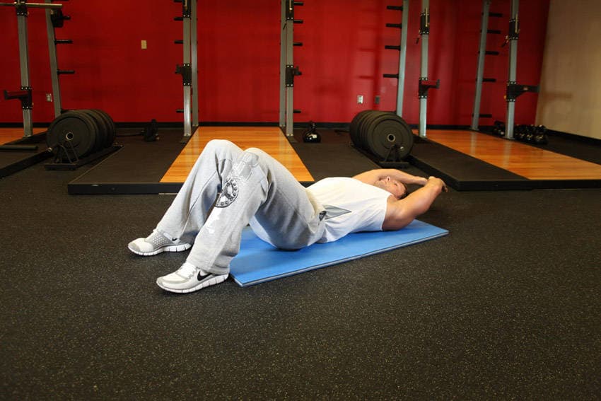 Crunch - Hands Overhead — starting position