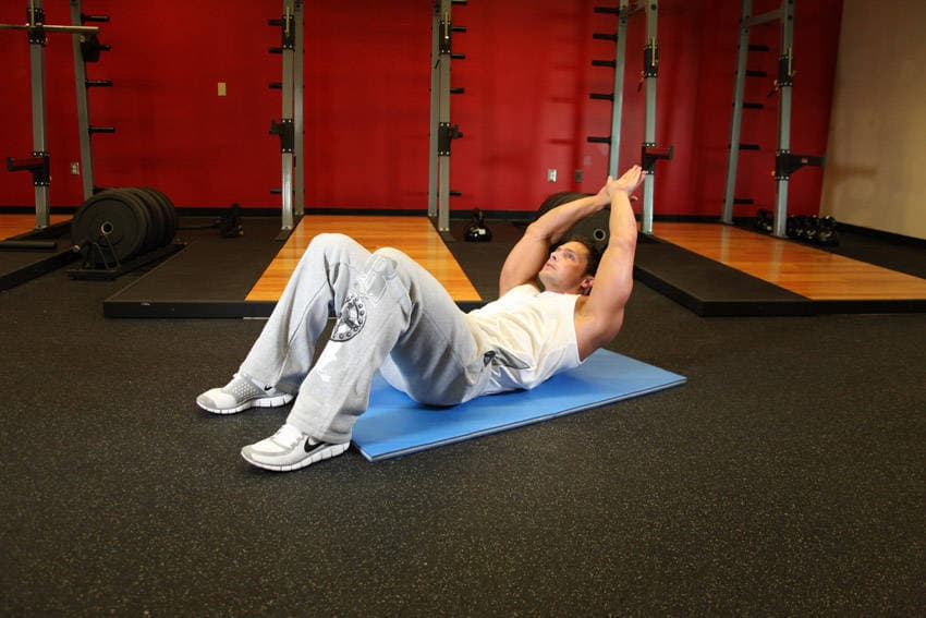 Crunch - Hands Overhead — end position
