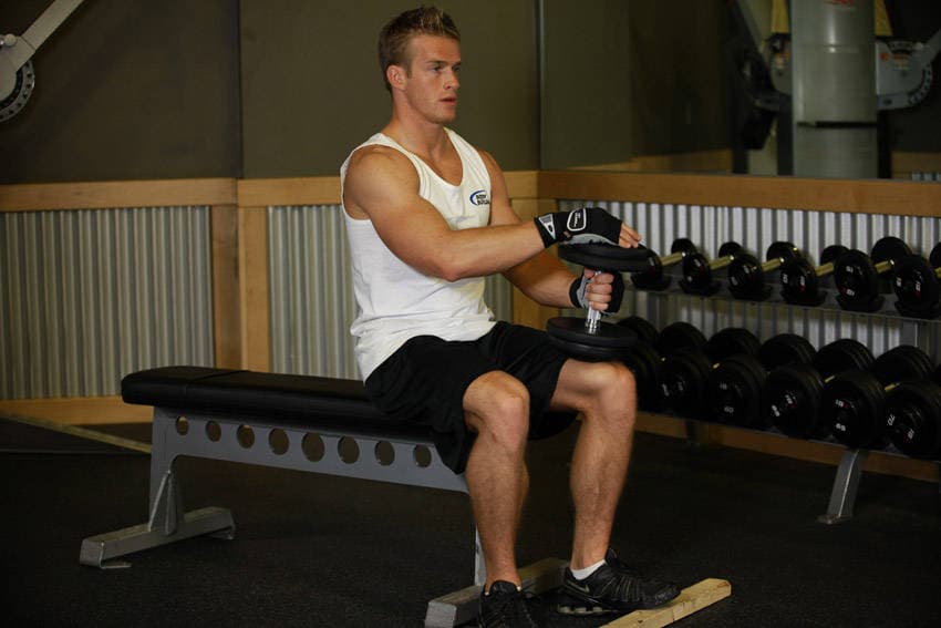 Dumbbell Seated One-Leg Calf Raise — end position