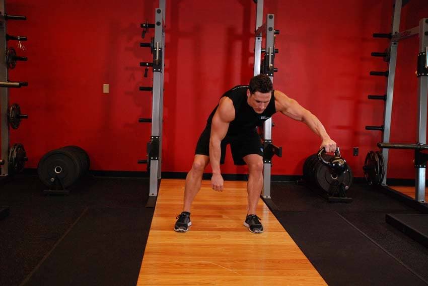 Kettlebell Pass Between The Legs — starting position