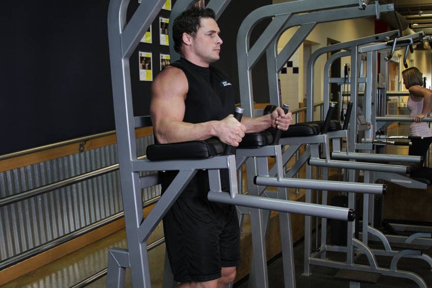 Knee/Hip Raise On Parallel Bars — starting position