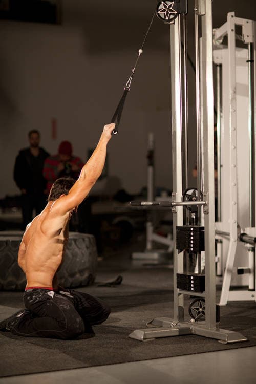 Kneeling Single-Arm High Pulley Row — starting position