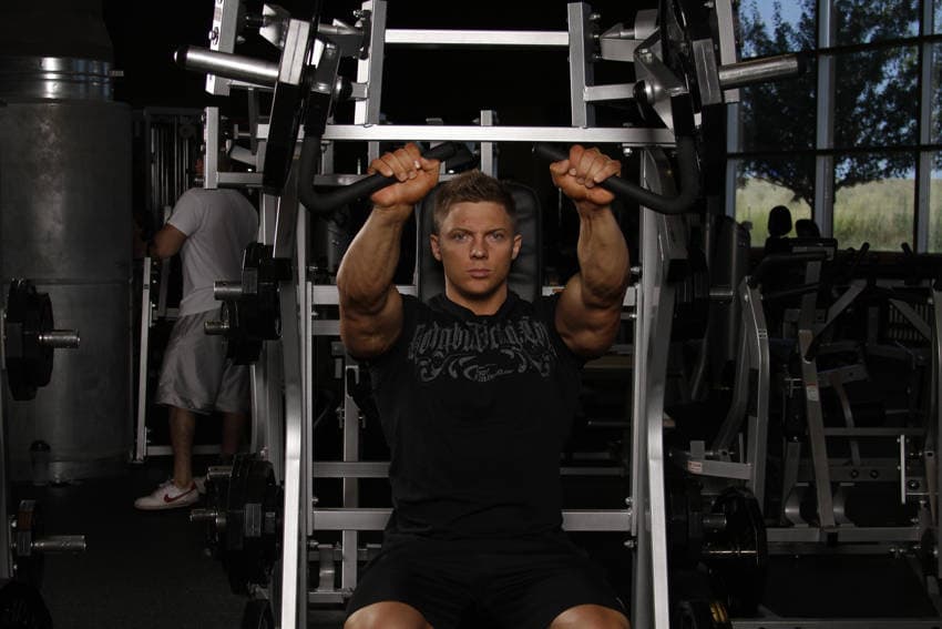Leverage Incline Chest Press — end position