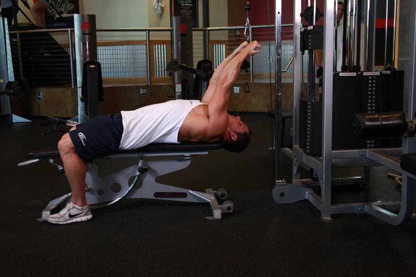 Lying Close-Grip Bar Curl On High Pulley — starting position