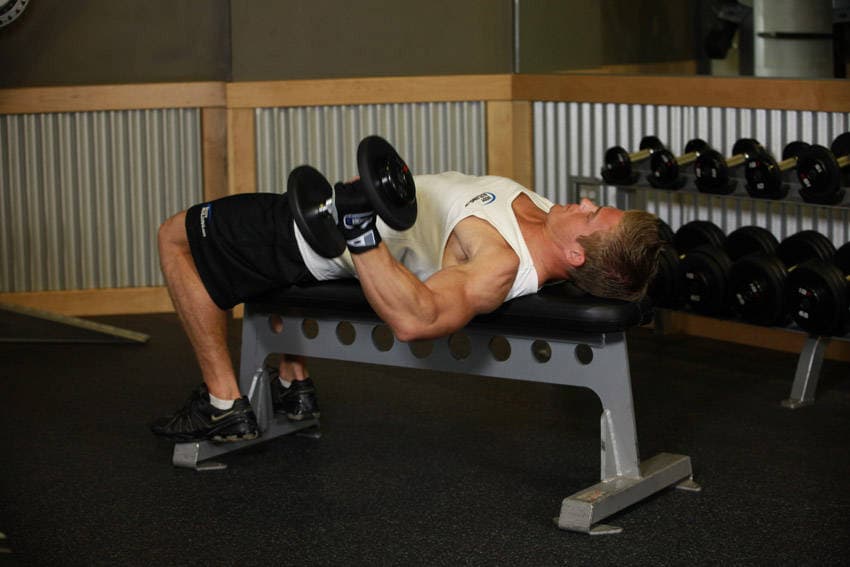 One-Arm Flat Bench Dumbbell Flye — starting position