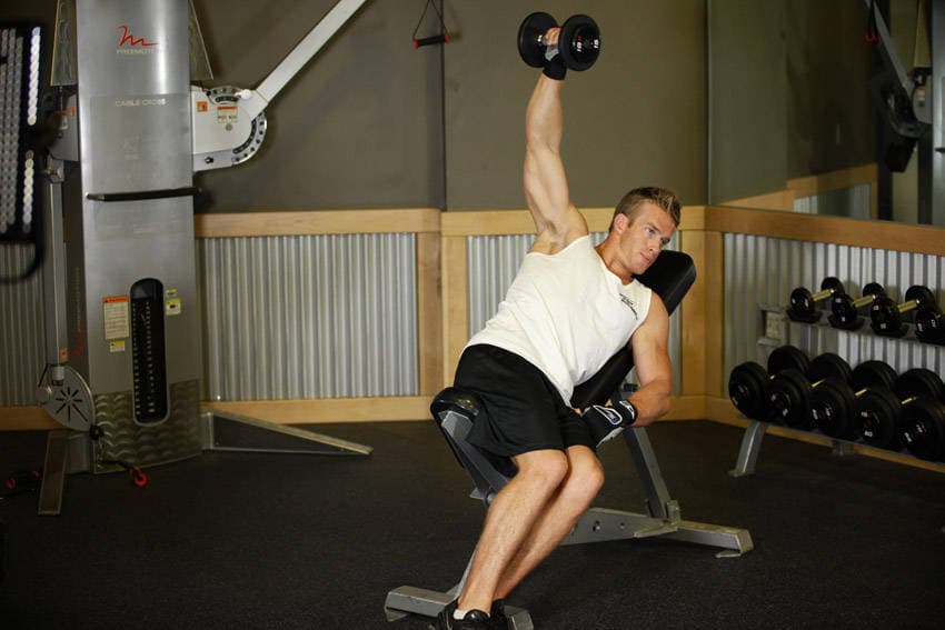 One-Arm Incline Lateral Raise — end position