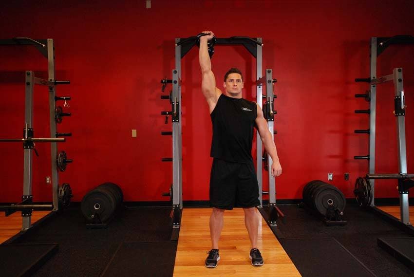 One-Arm Kettlebell Para Press — end position