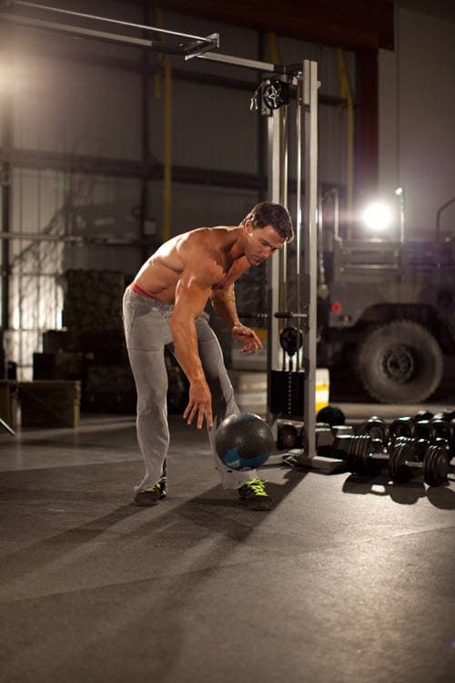 One-Arm Medicine Ball Slam — end position