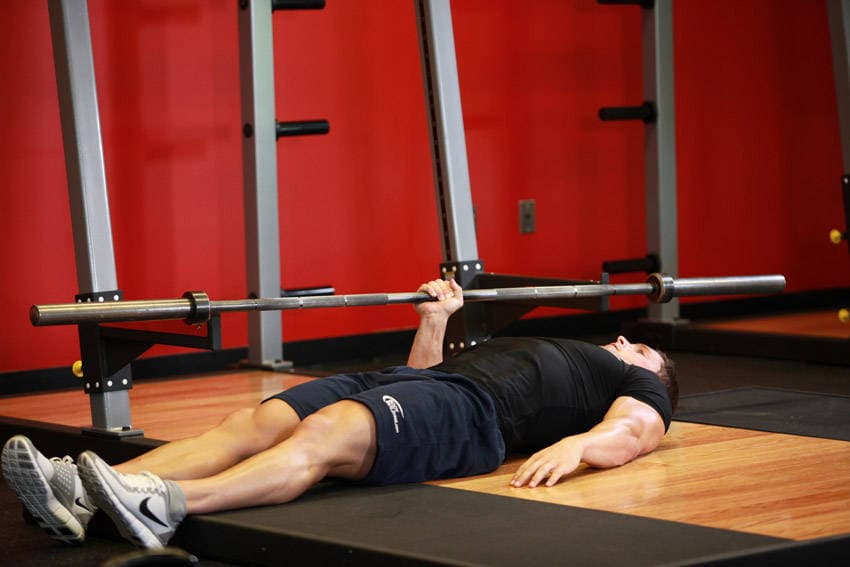 One Arm Floor Press — starting position