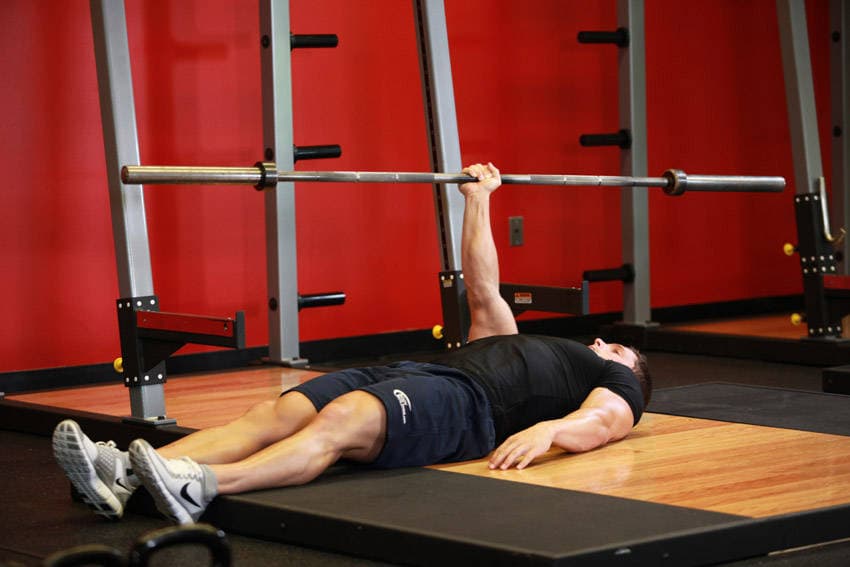One Arm Floor Press — end position