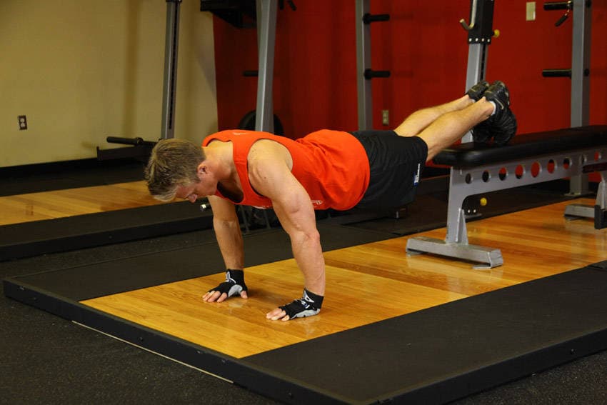 Push-Ups With Feet Elevated — starting position