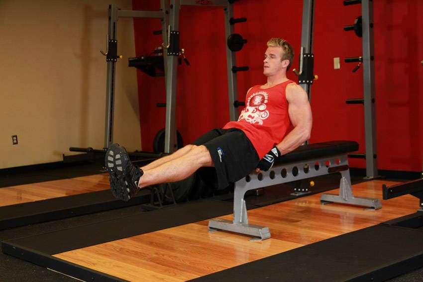 Seated Flat Bench Leg Pull-In — starting position
