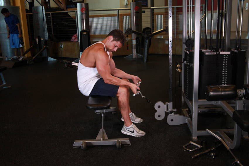 Seated Two-Arm Palms-Up Low-Pulley Wrist Curl — starting position