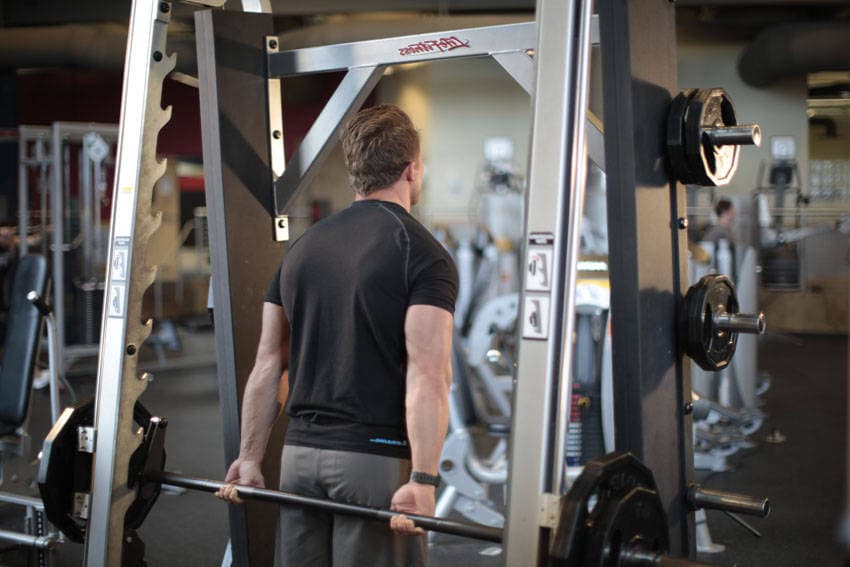 Smith Machine Behind the Back Shrug — starting position