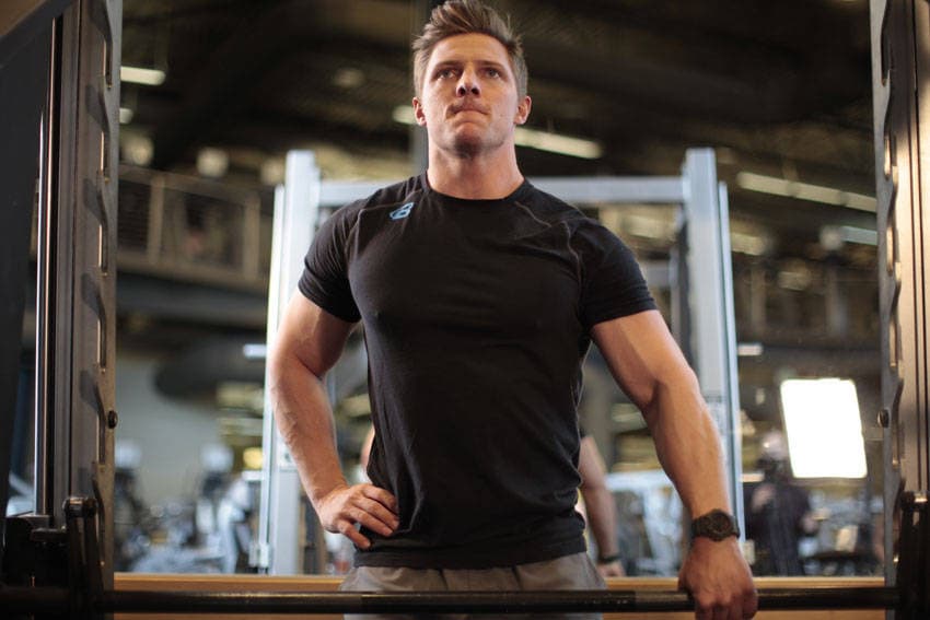 Smith Machine One-Arm Upright Row — starting position