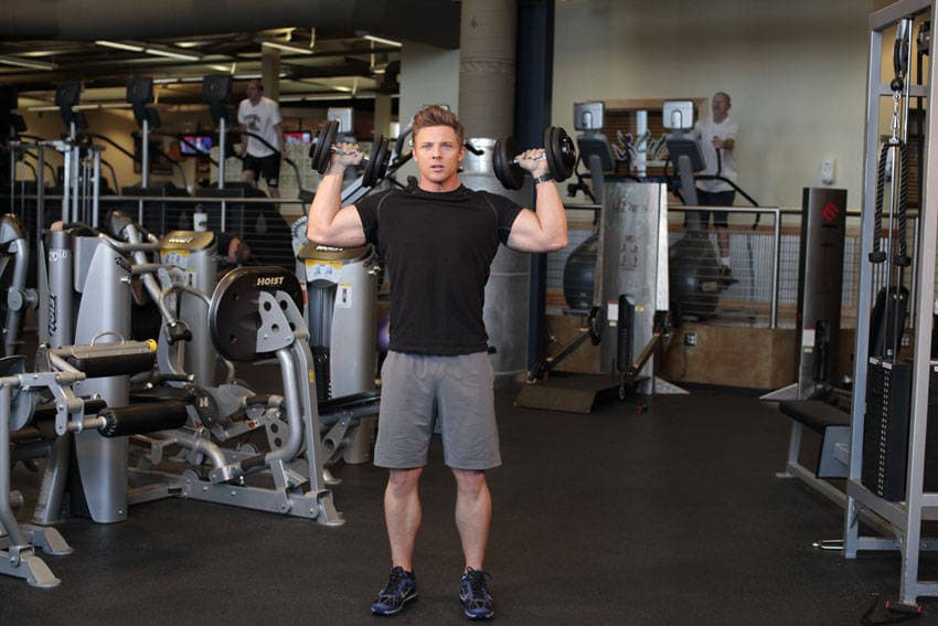 Standing Alternating Dumbbell Press — starting position