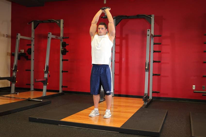 Standing Dumbbell Triceps Extension — starting position