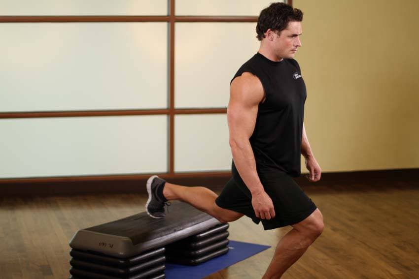 Standing Elevated Quad Stretch — starting position