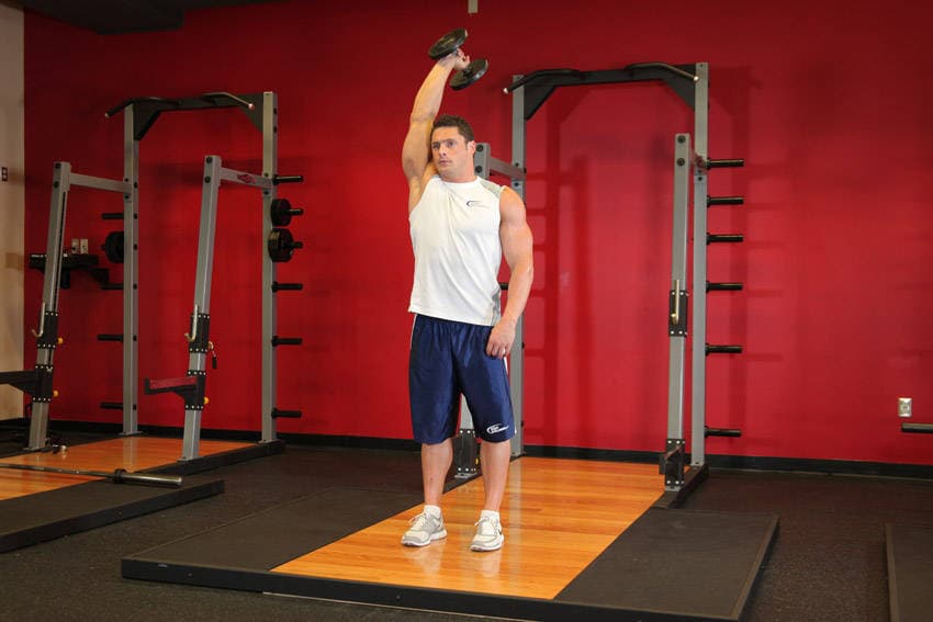 Standing One-Arm Dumbbell Triceps Extension — starting position
