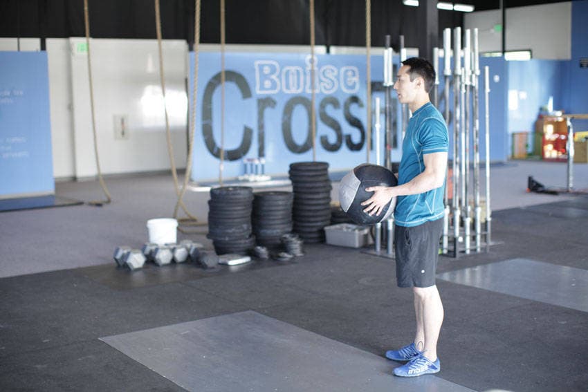 Standing Two-Arm Overhead Throw — starting position