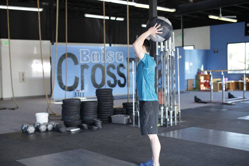 Standing Two-Arm Overhead Throw — end position