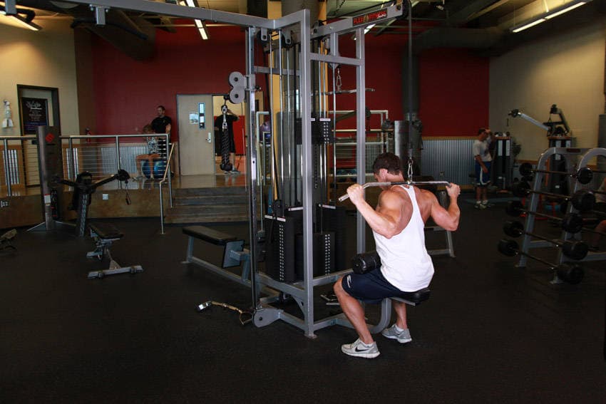 Wide-Grip Pulldown Behind The Neck — starting position